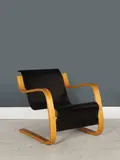 Alvar Aalto, Fauteuil mod. "31" dit "Cantilever", A '31' armchair in partially painted multi-ply birch by Alvar Aalto designed in 1932 and edited by Huonekalu-ja Rakennustyötehdas A