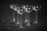 Suite de six coupes à champagne "Ambassades" by Walter Dorwin Teague & Edwin W. Fuerst, Pour Libbey Glass Company, en verre, sold May 2023