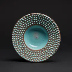 Plat by Jean Besnard, A monogrammed plate in enamelled ceramic by Jean Besnard designed in 1925, sold May 2023