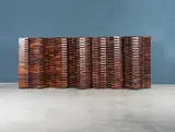 Poggi Editeur, Paravent, A rosewood and brass folding screen by Poggi Editeur  circa 1960-1970