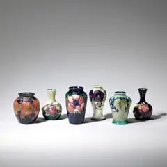 Moorcroft, Six small vases, early to mid 20th Century, Glazed and tube-lined earthenware