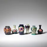 Moorcroft, Six small vases, early to mid 20th Century, Glazed and tube-lined earthenware