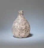 Séraphin Nikolaevich Soudbinine, Faceted vase, circa 1930, Stoneware, the oviform with faceted sides covered with a thick, dappled pink and grey/brown glaze
