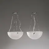 A pair of 'St Vincent' plafonniers vasque, designed 1926 by René Lalique, Clear glass, frosted and polished, sold Dec 2023