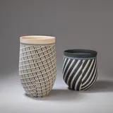 Marian Gaunce, Two vessels, circa 1985, Porcelain, laminated white, grey, blue and pink clays forming geometric patterns