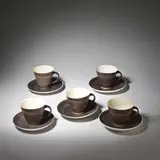 Lucie Rie and Hans Coper, Five cups and saucers, circa 1958, Stoneware, white and manganese glaze with sgraffito design