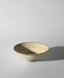 Conical bowl by Lucie Rie, circa 1968, Stoneware, mixed clays producing an integral spiral, offered Dec 2023