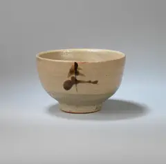 Bowl by Shoji Hamada, Stoneware, cream and crawling grey glazes with brushed iron design, offered Dec 2023