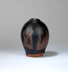 Bernard Leach, Early vase, circa 1935, Stoneware, thick tenmoku glaze with blue hue over incised design
