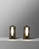 Eugène Printz, Two table lamps, commissioned by Maître Durand-Villette, 5 rue Cognacq-Jay, Paris, 1942, Patinated copper, oxidized brass, frosted glass, painted wood