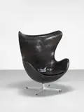 Arne Jacobsen, Early 'Egg' armchair, model no. 3317, designed 1958, manufactured 1963, Leather upholstery, aluminium, acrylic