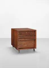 Drawer unit, designed 1959, produced 1960s by Bodil Kjær, Brazilian rosewood-veneered wood, beech, brass, steel and acrylic castors, offered Oct 2023