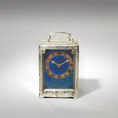 'Tudric' cased carriage clock, model no. 0721 by Liberty & Co., circa 1905, Pewter, enamel, copper and glass, sold Jun 2023