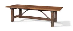 Malcolm Powell, Refectory table, circa 1894, Oak, the top made from three planks, raised on square supports united by plain stretchers and chamfered wishbone stretchers