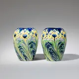 Pair of 'Peacock Feathers' vases by William Moorcroft, circa 1902, Glazed earthenware, of ovoid form, offered Jun 2023