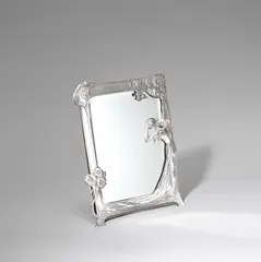 Easel table mirrior, model no.131 by Wmf, circa 1900, Polished metal, the frame cast in relief with an Art Nouveau maiden, bevelled glass, sold Jun 2023