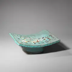 Colin Pearson, Chinese ceramic pillow, Stoneware, footed with curved headrest, openwork design and vibrant turquoise glaze