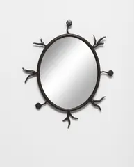 'Medusa' mirror, designed 2020 by Eric Schmitt, Patinated wrought iron, mirrored glass, sold Apr 2023