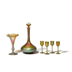 Decanter Set by Tiffany Studios, Favrile glass, comprising a decanter with stopper and four cordials, decanter inscribed 'L, sold Oct 2023