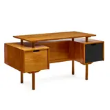 Milo Baughman, Floating Top Desk with Bookshelf, for Glenn of California, bleached and lacquered walnut, ebonized peg board, top left fitted drawer branded 'Glenn OF CALIFORNIA'