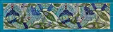 William De Morgan, Four-Tile 'India Frieze' Panel, painted with a continuous leafy floral branch, glazed earthenware, surrounded by border tiles, framed