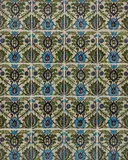Twenty-Tile 'New Persian' Panel by William De Morgan, colorfully painted in hues of green, blue and black in Islamic style, glazed earthenware, impressed 'W, sold Dec 2023