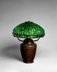 'Turtle Back Tile' Table Lamp by Tiffany Studios, leaded glass, patinated bronze, shade stamped 'Tiffany Studios,' base stamped with Tiffany Studios monogram and numbered, offered Dec 2023