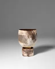 Hans Coper, Pot on Foot, stoneware, layered white porcelain, manganese glaze, incised with artist's monogram