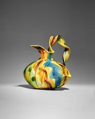 'Pillow Pitcher' by Betty Woodman, glazed earthenware, decorated in colored slips, impressed 'WOODMAN', sold Dec 2023