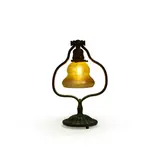 Harp Table Lamp by Tiffany Studios, patinated bronze, decorated Favrile glass, the base stamped 'TIFFANY STUDIOS NEW YORK 419' on underside, fitter rim inci, sold Jul 2023