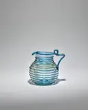 Pitcher by Salviati & C., blown and applied glass with aquamarine spiral threads, sold Nov 2022