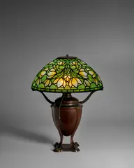 Crocus Table Lamp by Tiffany Studios, leaded glass, patinated bronze, base stamped 'TIFFANY STUDIOS NEW YORK D888', sold Jun 2023