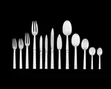 Jean E Puiforcat, Eighteen-Place Setting "Monaco' Flatware Service, Sterling silver, in a fitted mahogany chest