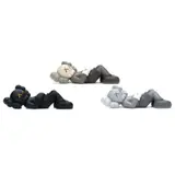 Kaws, Holiday Japan - Set of Three, painted cast vinyl (with case)