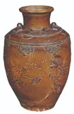 Untitled by Martaban Jar with Dragon Motif Qing Dynasty, brown glazed, sold Mar 2020