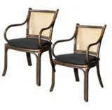 Untitled by A Pair of Enrique Murio Armchairs, rattan and abaca, sold Mar 2020