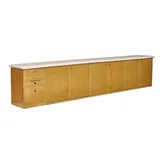 Long Custom Cabinet by Ettore Sottsass, executed by Sottsass Associati for the Mayer-Schwarz Gallery, Beverly Hills, maple and painted maple, sold Mar 2023