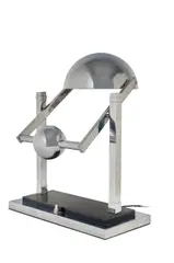 Lampe de table à système de balancier by Jacques Adnet, A chromed metal lamp with a pendulum system by Jacques Adnet designed circa 1930, sold Dec 2022