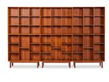 Mogens Koch, PETER HVIDT & ORLA MOLGAARD-NIELSEN Bibliothèque modulable à six éléments création circa 1950  Édition Søborg Møbler, en teck verni H (meuble bas): 94cm.(37in.); H (caisson haut): 76,5cm.(29 15/16in.); L: 90cm.(35 7/16in.); P: 27,5cm.(10 5/8in.).    A modular teak wood bookshelf with six elements by Peter Hvidt & Orla Molgaard-Nielsen designed circa 1950