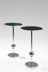 Osvaldo Borsani, Deux tables d'appoint mod. T1, Two chromed steel and tinted glass model T1 side tables by Osvaldo Borsani designed circa 1950, ABV collection second edition of 1991