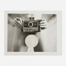 Robert Mapplethorpe, Self Portrait with Camera, Invitation to Light Gallery Opening, January 6, 1973, 1973, vintage gelatin silver print from Polaroid negative with adhesive dot in a protective Polaroid Polacolor Land Film sleeve