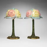 Pairpoint, Puffy boudoir lamps with roses, pair, c. 1915, reverse-painted frosted glass, patinated metal