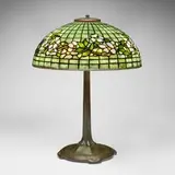 Dogwood Band table lamp by Tiffany Studios, c. 1910, leaded glass, patinated bronze, sold Jul 2025