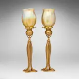 Cats Paw candlesticks with shades, pair by Tiffany Studios, c. 1910, acid-etched and gilt bronze, hand-blown Favrile glass, sold Jul 2025
