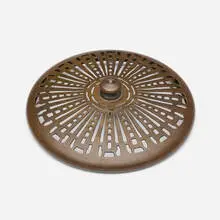 Heat cap by Tiffany Studios, c. 1910, patinated bronze, sold Jul 2025