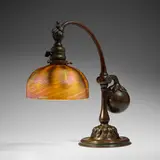 Damascene counterbalance desk lamp by Tiffany Studios, c. 1910, hand-blown Favrile glass, patinated bronze, sold Jul 2025