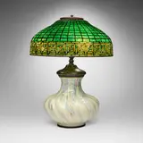 Greek Key table lamp by Tiffany Studios, c. 1910, leaded glass, patinated bronze, sold Jul 2025