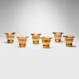 Quezal, Collection of six ruffled shades, c. 1910, hand-blown glass