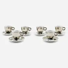 Cappuccino cup and saucer set by William Kentridge, 2008, glazed porcelain, sold Dec 2023