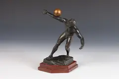 E. Hamburger, Untitled, NUDE MALE ATHLETE WITH GOLD BALL, bronze, signed